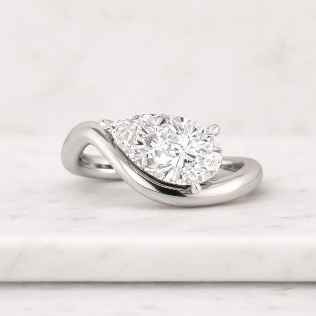 Pear Moissanite Wave Wedding Band