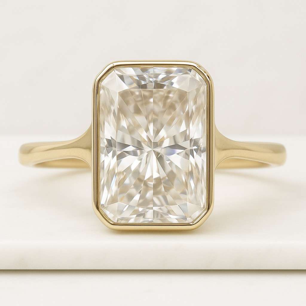 radiant cut moissanite engagement ring yellow gold double prong