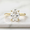 Oval Cut Cathedral Style Moissanite Engagement Ring