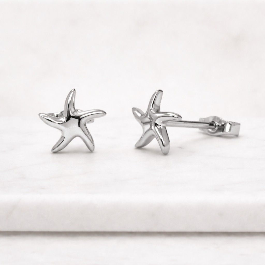 gold starfish stud earrings in 18k gold