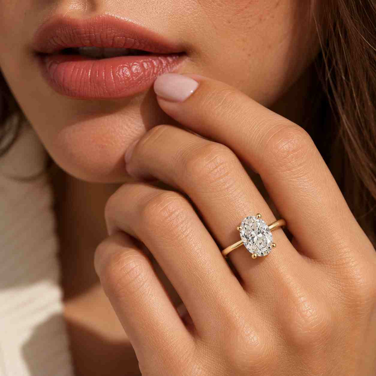 solid gold solitaire oval cut moissanite engagement ring 4 prongs cathedral set