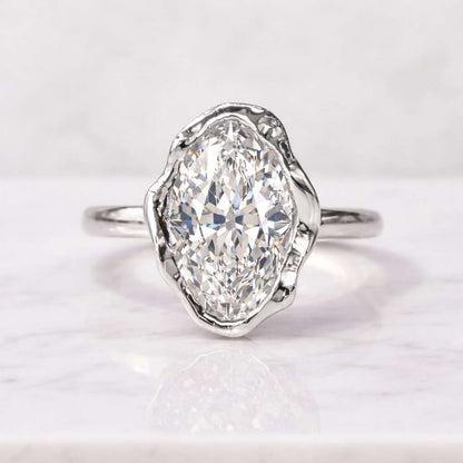Unique Solitaire Engagement Ring