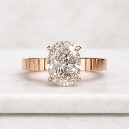 Unique Solitaire Engagement Ring