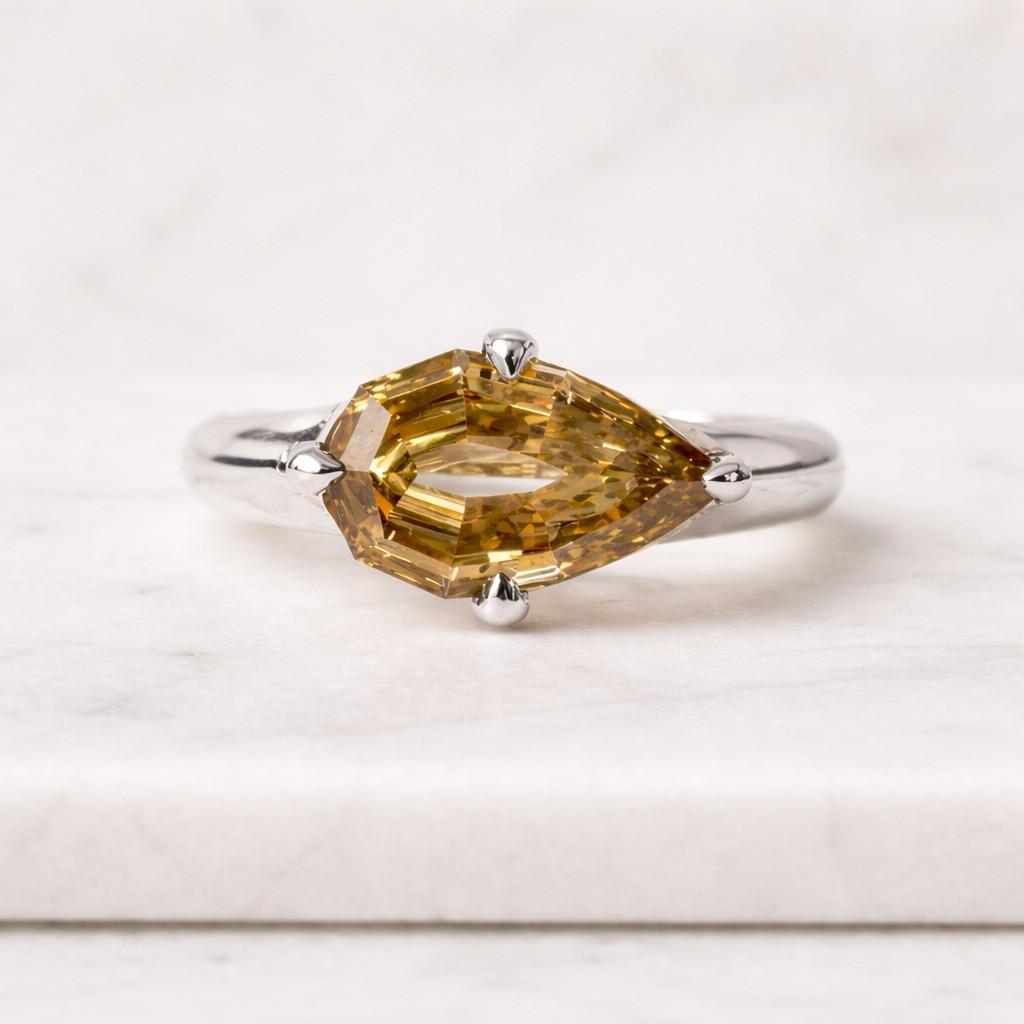 fancy yellow pear ring | prong set engagement ring | canary yellow diamond ring | pear cut solitaire ring | minimalist gold ring