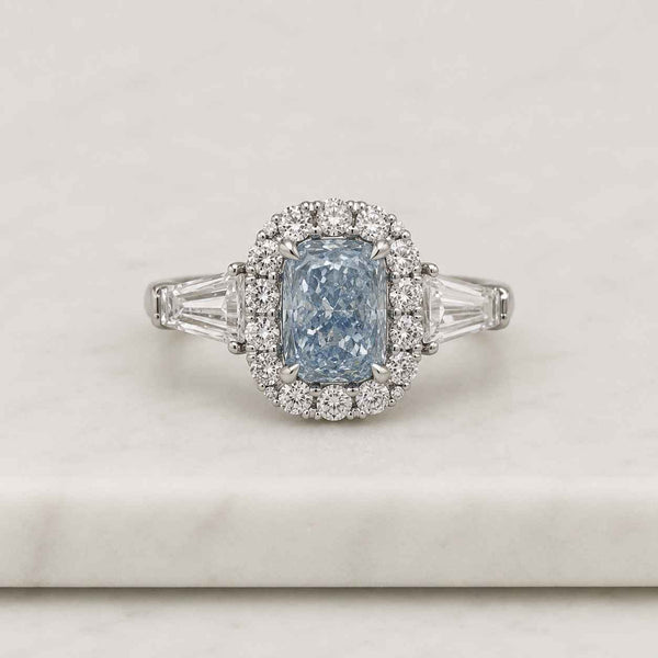 blue ring engagement ring halo ring cushion ring radiant ring cocktail ring promise ring bridal ring women ring fine jewelry statement ring center stone halo setting tapered band four prong ring