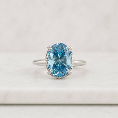 created diamond gemstone ring blue gemstone oval gemstone sparkling gemstone faceted gemstone clear accent stones halo stones