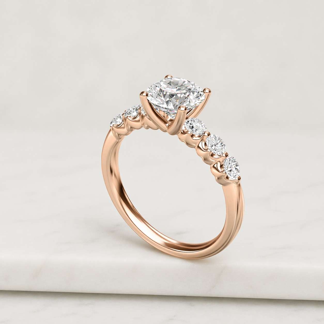 round cut moissanite cathedral engagement ring, three-sided pave band, hidden diamond accent