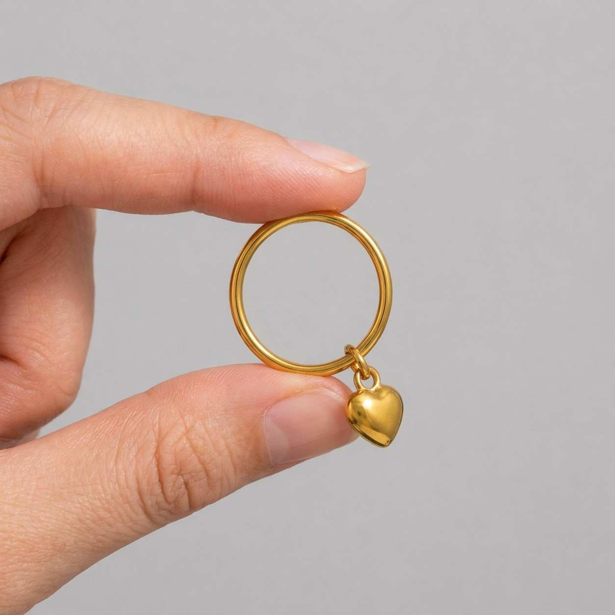 dangling heart ring puff heart ring smooth heart ring sleek ring charm jewelry gold jewelry minimalist ring stackable ring layering ring fine jewelry petite ring chic ring