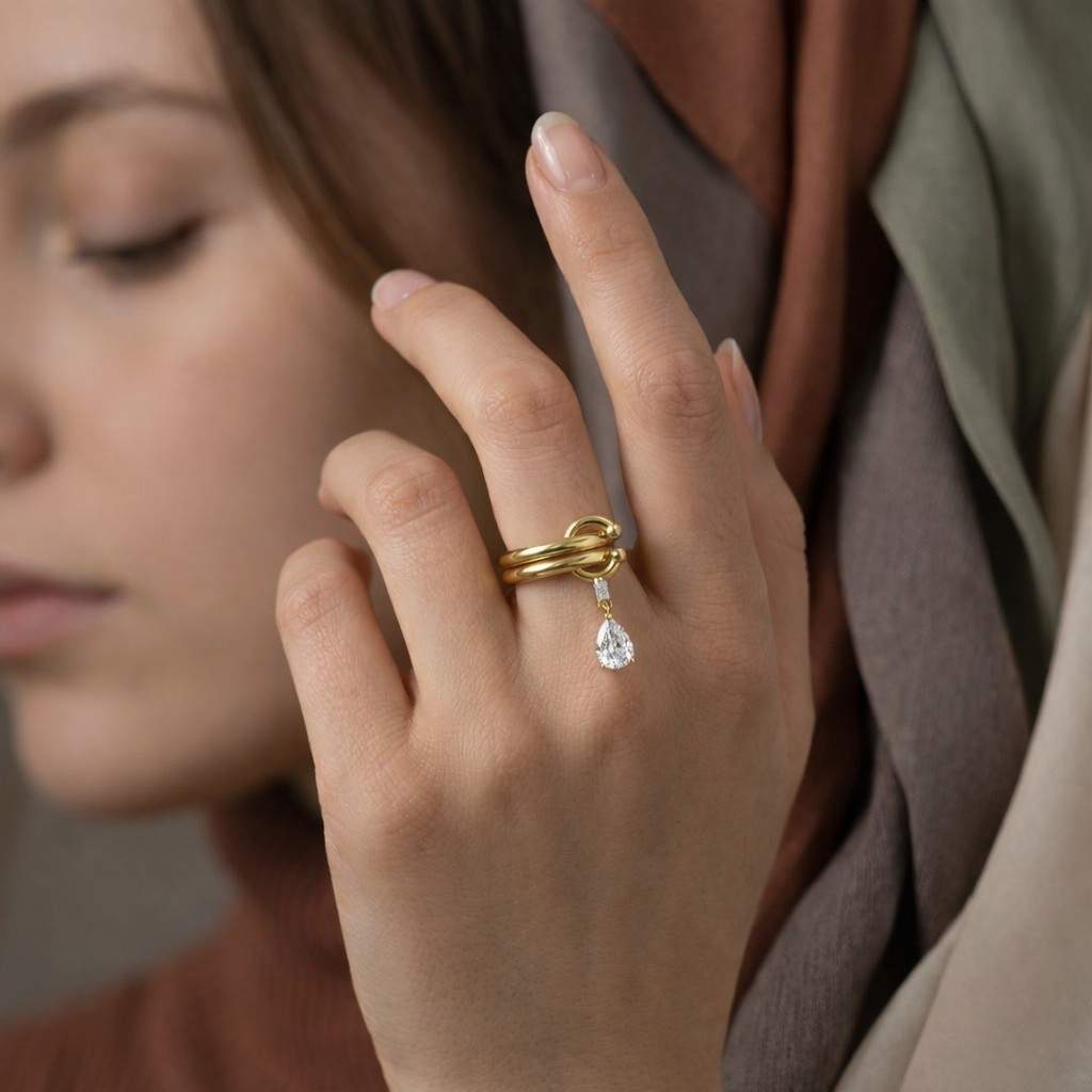 pear diamond dangle ring | modern gold knot band | minimalist statement bridal jewelry
