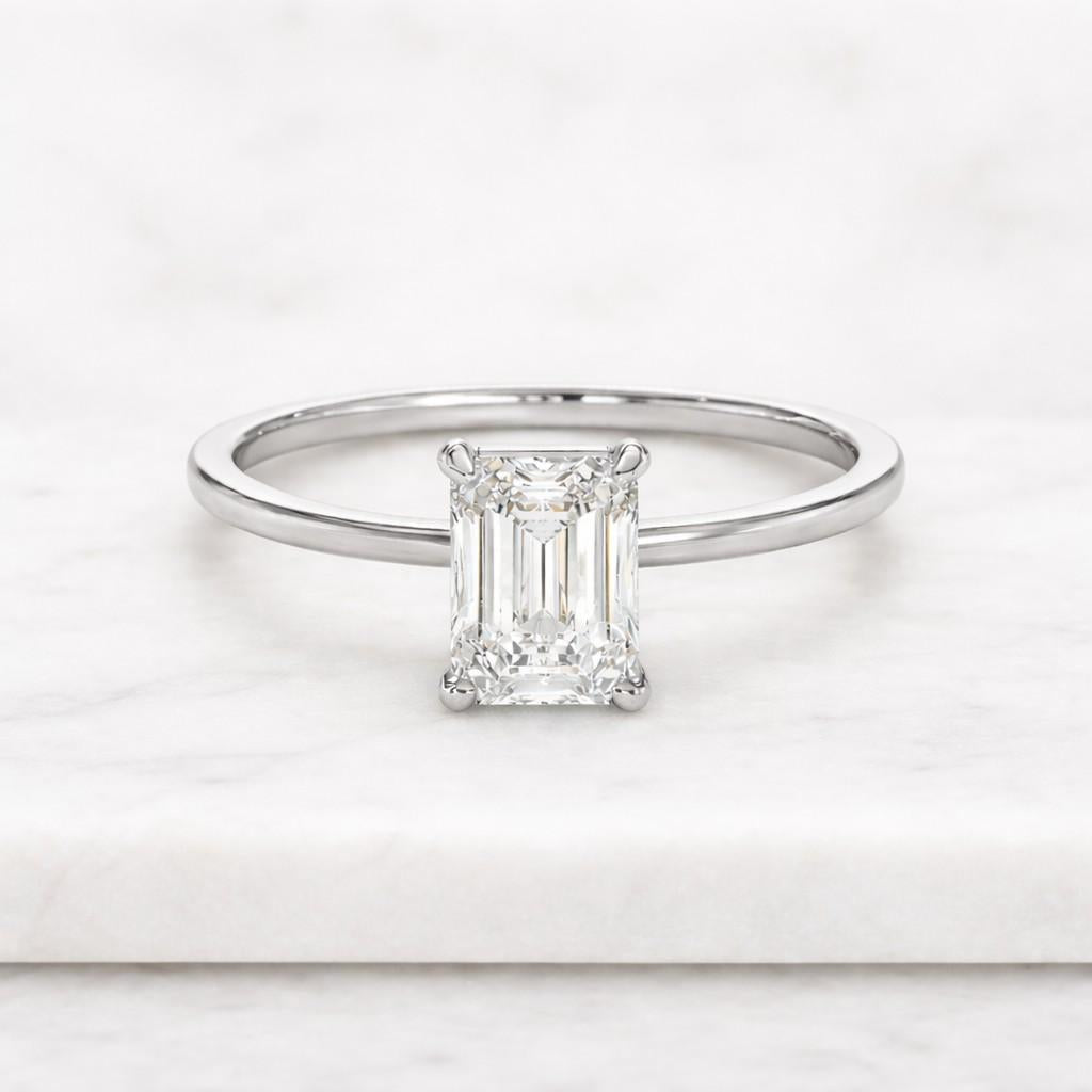 1.50 carat emerald cut lab grown diamond engagement ring: e-f vvs2-vs1
