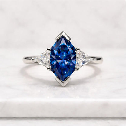 dutch marquise cut ring blue gemstone ring three stone ring side stone ring tapered diamond ring claw prong ring cathedral ring sleek ring