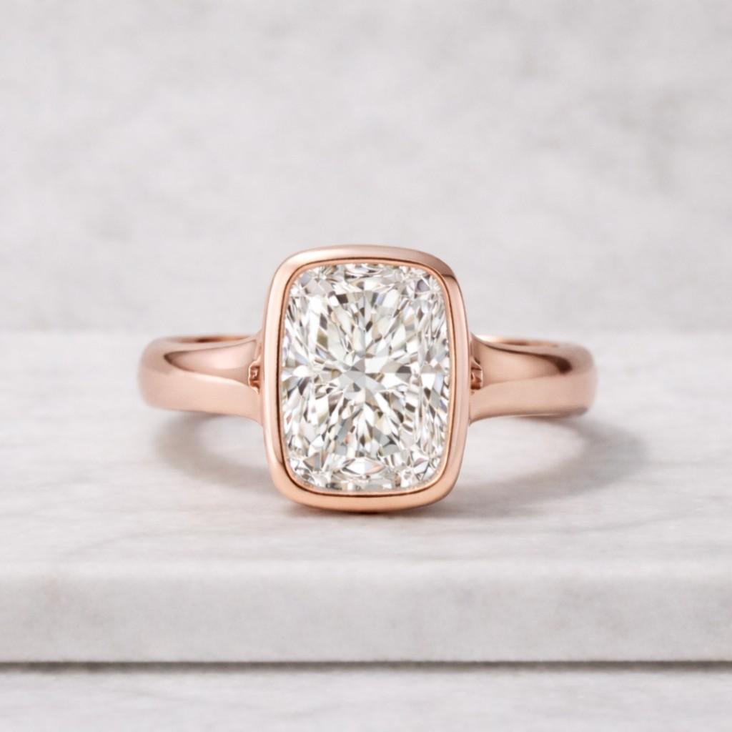elongated cushion cut lab grown diamond ring bezel set yellow gold engagement ring modern minimalist solitaire diamond ring for women everyday wear usa high clarity diamond ring gift for her