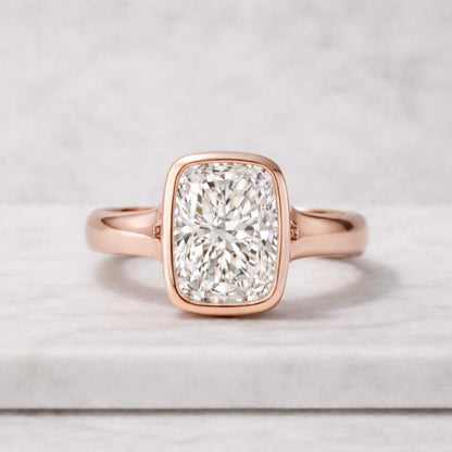 elongated cushion cut lab grown diamond ring bezel set yellow gold engagement ring modern minimalist solitaire diamond ring for women everyday wear usa high clarity diamond ring gift for her