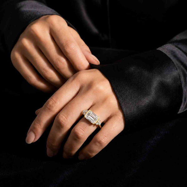 emerald engagement ring emerald solitaire ring emerald bezel ring rectangular ring geometric ring clean lines ring sleek ring yellow gold ring slim band ring elegant jewelry modern jewelry bridal jewelry wedding jewelry