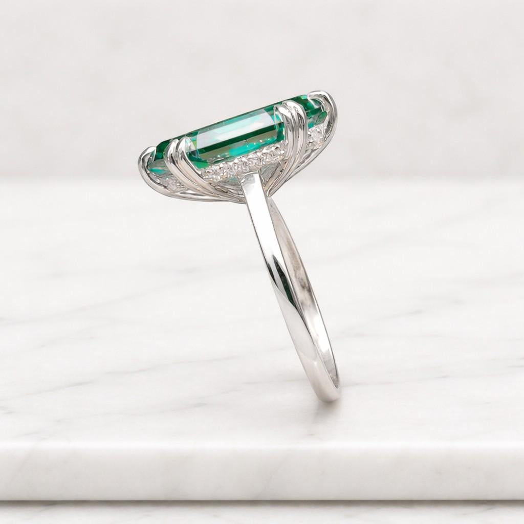 emerald green ring faceted ring crystal ring clean lines ring sleek ring contemporary ring tapered band ring designer ring artisan ring shiny ring polished ring stacking ring