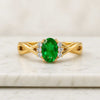 Oval Cut Emerald Gemstone and Diamond Infinity Ring