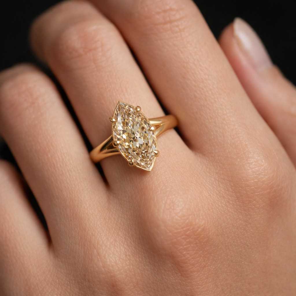 feminine ring luxury jewelry ring setting center stone marquise cut elongated stone north south ring yellow metal ring