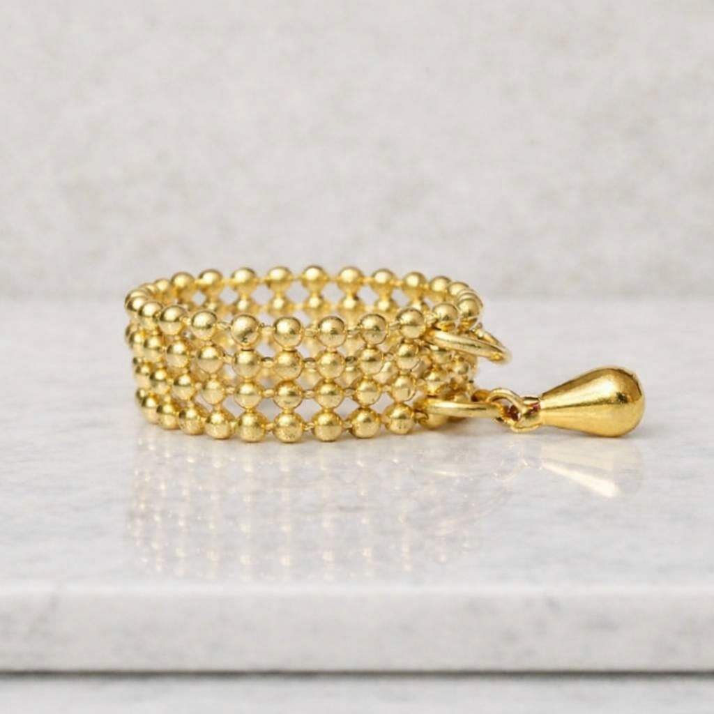 genuine gold ring gold jewelry ring gold band ring gold charm ring gold bead ring gold fashion ring gold accessory ring rich gold ring polished gold ring shiny gold ring