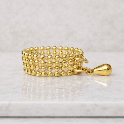 genuine gold ring gold jewelry ring gold band ring gold charm ring gold bead ring gold fashion ring gold accessory ring rich gold ring polished gold ring shiny gold ring