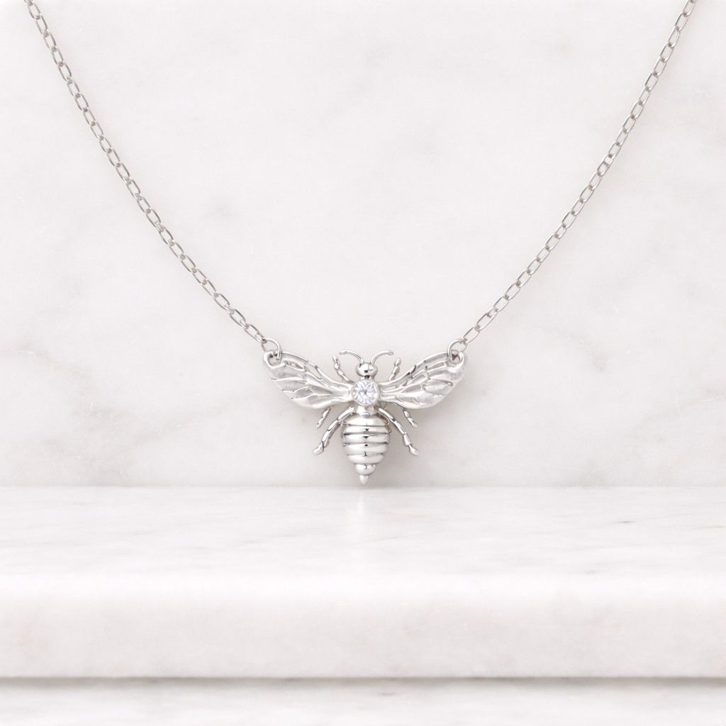 floating diamond bee necklace - solid gold bee pendant. 14k, 18k yellow, rose, white gold and platinum.
