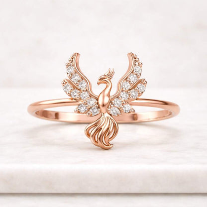 gold phoenix ring for women lab grown diamond ring 18k gold symbolic rebirth jewelry gift for her phoenix bird ring delicate diamond accent gold band modern fine jewelry usa trending ring design meaningful jewelry women everyday wear ring