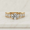 Round Cut Lab Grown Diamond Engagement Ring with Oval Side Stones