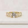 Round Cut Lab Grown Diamond Engagement Ring with Emerald Cut Side Stones