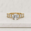 Round Cut Lab Grown Diamond Bezel Set Engagement Ring With Emerald
