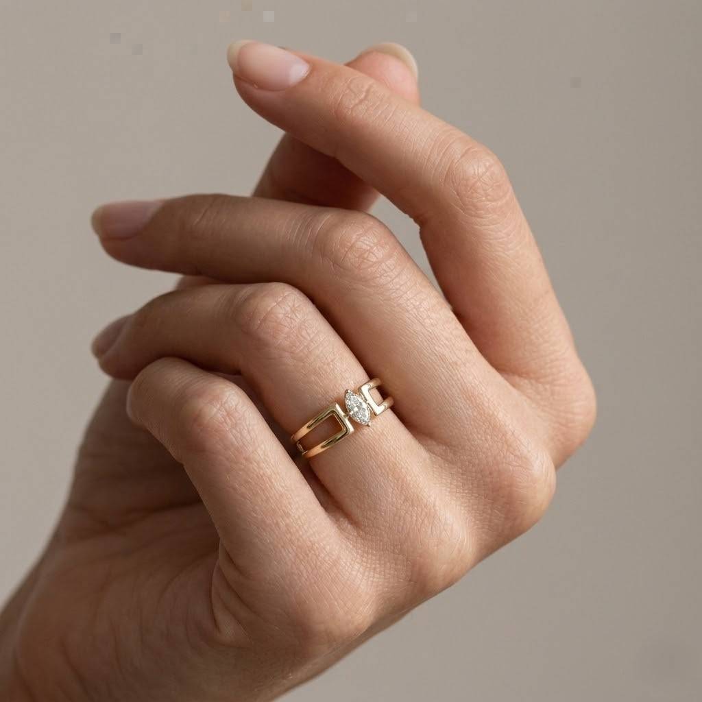 gold ring marquise ring open ring statement ring geometric ring modern ring unique ring band ring women ring fine jewelry luxury ring minimalist ring bold ring sleek ring polished ring shiny ring stackable ring