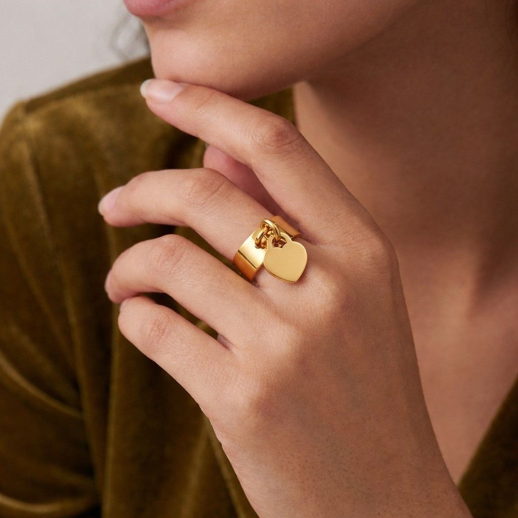 gold tone ring sleek ring elegant ring simple ring clean design ring statement jewelry trendy jewelry gift for her romantic jewelry heart accessory luxury ring modern jewelry
