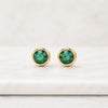 Round Cut Emerald Bezel Set Stud Earrings in 14K Yellow Gold