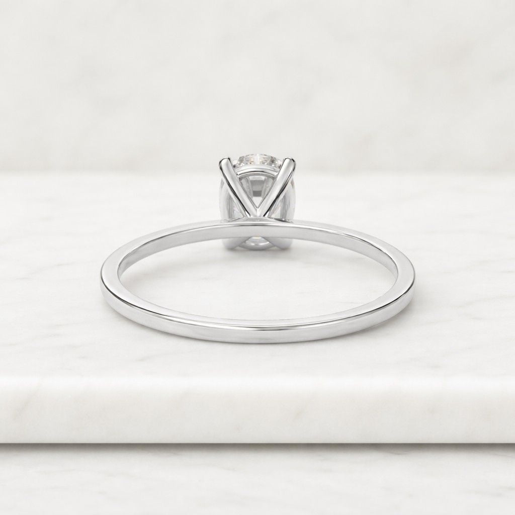 2 carat elongated cushion lab grown diamond solitaire hidden halo engagement ring | 14k white gold band