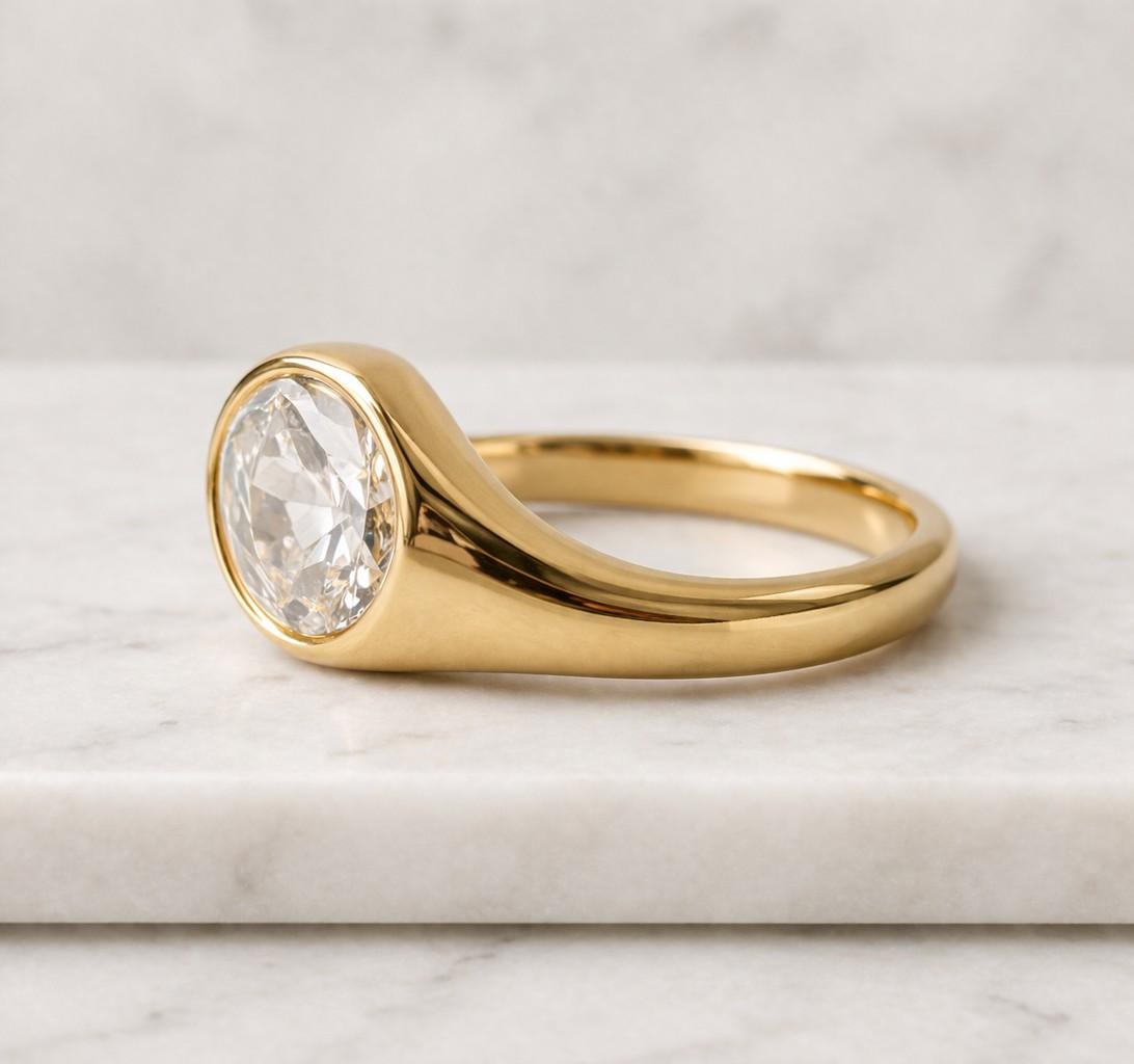 1.5 ct oval lab engagement ring, east west bezel, 18k yellow gold wedding band