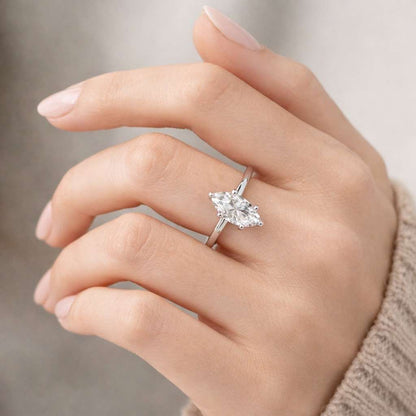 Solid Gold Marquise Moissanite Engagement Ring, Cathedral Setting
Max
