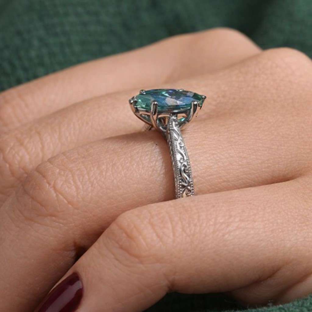 marquise cut ring teal gemstone ring aqua stone ring ocean color ring elongated ring leaf shape ring north south ring decorative shank engraved shank detailed band