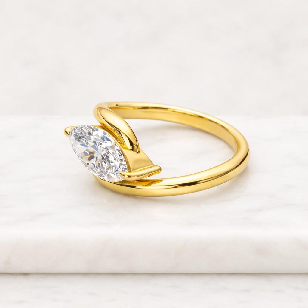 marquise cut solitaire engagement ring | yellow gold bypass bridal jewelry