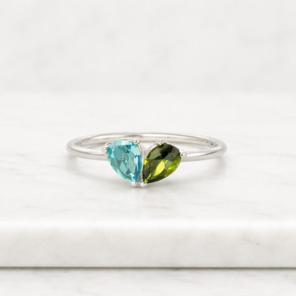 solid gold toi et moi pear lab grown emerald & pear moissanite engagement ring,