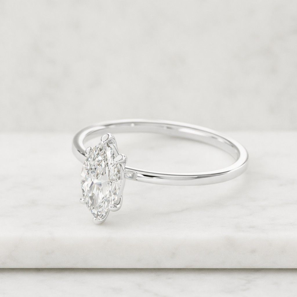 marquise e color vvs2 clarity igi certified marquise cut lab grown diamond solitaire engagement ring with hidden halo of round diamonds

