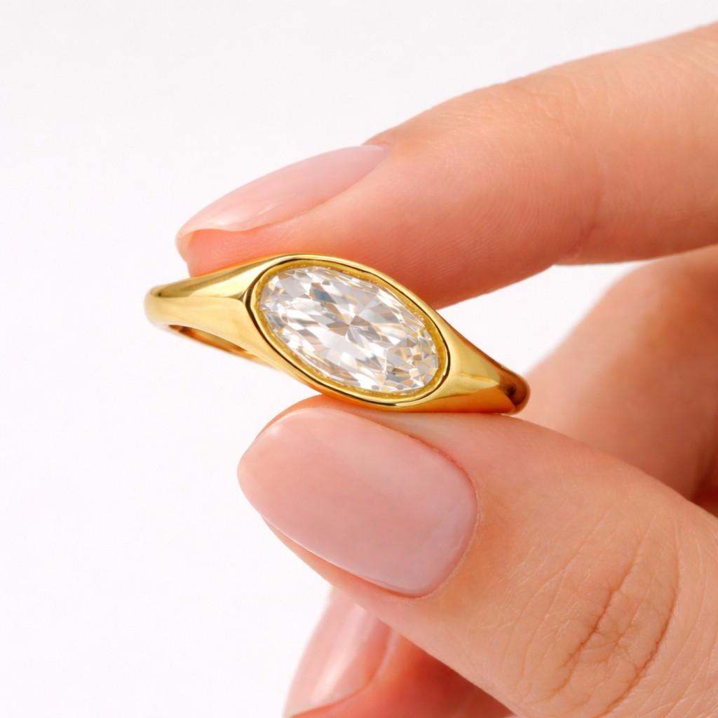 igi certified oval lab grown diamond ring, bezel set solitaire engagement ring set, minimalist curved wedding band, 14k gold bridal ring set