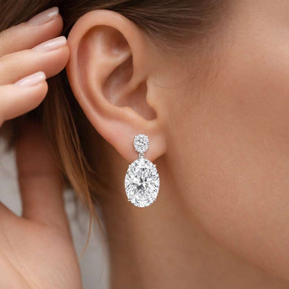 oval earrings drop earrings dangle earrings stud earrings halo earrings bridal earrings women earrings statement earrings luxury earrings silver earrings shiny earrings