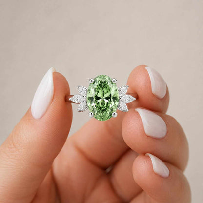oval engagement ring green engagement ring green crystal ring botanical ring flower ring leaf inspired ring marquise side stone oval cut ring green jewel ring solitaire style ring
