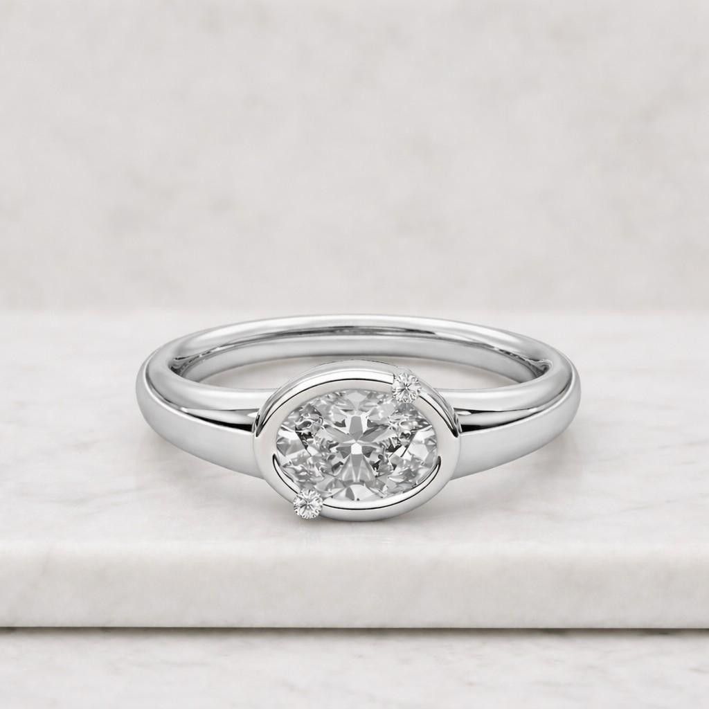 east to west 3ct oval cut moissanite bezel set solitaire ring, paired with matching curved shape plain band, 925 silver bridal ring set