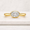 Oval Cut Lab Grown Diamond Bezel Engagement Ring