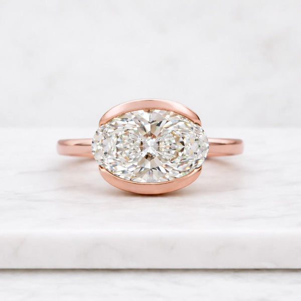 1.50ct Oval Lab Grown Diamond Bezel Engagement Ring | IGI Certified | D-E-F Color | VVS–VS Clarity | Yellow Gold
