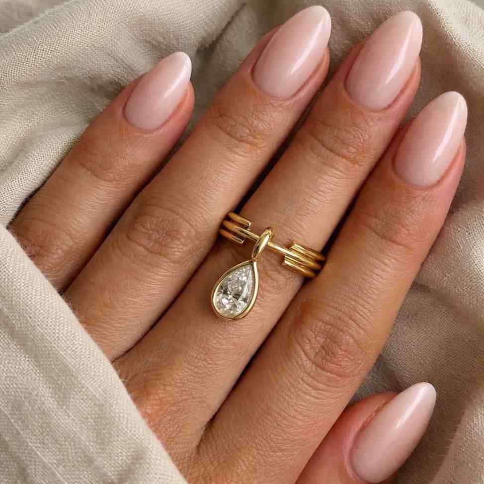 pear cut ring teardrop stone ring bezel set ring gold band ring layered band ring floating stone ring solitaire ring artistic ring minimalist ring luxury ring shiny ring smooth band