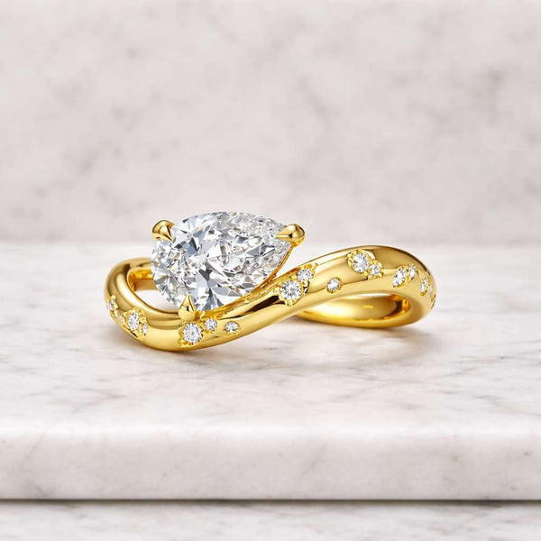 pear ring gold ring engagement ring solitaire ring statement ring wrap ring bypass ring twisted band curved ring open ring promise ring bridal ring