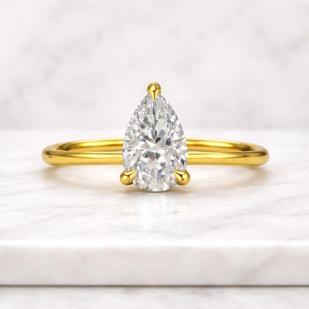 pear cut lab grown diamond engagement ring | 1.11 ctw igi certified diamonds | solitaire ring with secret halo diamonds
