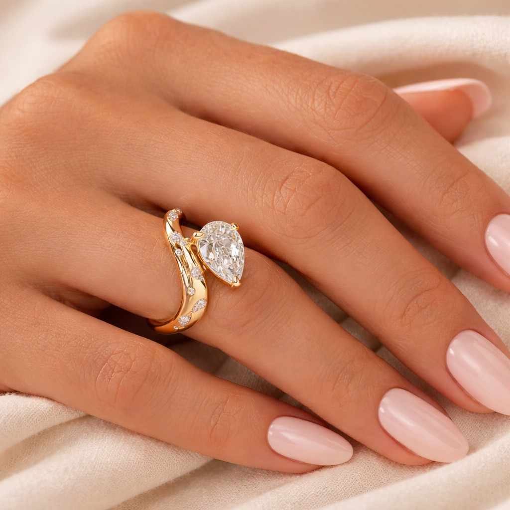 pear shaped ring pear cut ring teardrop ring twisted ring bypass band crossover ring pave ring accent stone ring solitaire setting floating stone ring