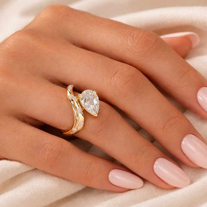pear shaped ring pear cut ring teardrop ring twisted ring bypass band crossover ring pave ring accent stone ring solitaire setting floating stone ring