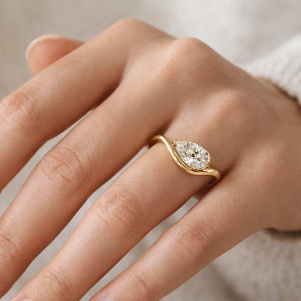 pear stone ring finger ring luxury ring modern ring sleek ring polished ring shiny ring classic ring handmade ring artisan ring